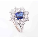 A SAPPHIRE AND DIAMOND RING,