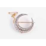 A VICTORIAN DIAMOND CRESCENT BROOCH, circa 1870-1880,