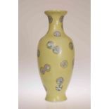 A CHINESE YELLOW SGRAFFITO GROUND VASE, LATE 19TH/EARLY 20TH CENTURY, of shouldered ovoid form,