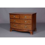 AN EDWARDIAN FADED SATINWOOD BOW-FRONTED CHEST OF DRAWERS, WARING & GILLOW,