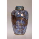 A WEDGWOOD LUSTRE VASE AND COVER, decorated with a dragon on a blue lustre ground, pattern no.