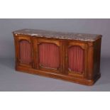 A 19TH CENTURY MARBLE TOPPED SIDE CABINET, the moulded top above three drawers with brass grills,