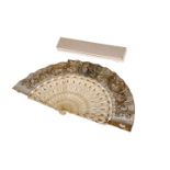 A 19TH CENTURY BONE FAN, with colour printed paper leaf, the guards set with a mirror and cameo,