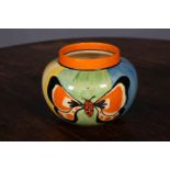 CLARICE CLIFF FANTASQUE VASE, hand-painted with two butterflies, Wilkinson Factory mark. 11.