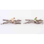 A PAIR OF DIAMOND AND ENAMEL BROOCHES DEPICTING RACEHORSES AND JOCKEYS, circa 1939,