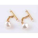 A PAIR OF NATURAL SALTWATER PEARL CUFFLINKS,