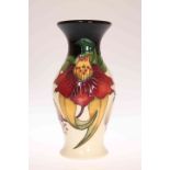 A MOORCROFT "ANNA LILY" VASE, first quality, retains original price label of £335. 19.