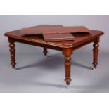 A VICTORIAN MAHOGANY WIND-OUT EXTENDING DINING TABLE, extending to 7'8",