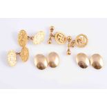 THREE PAIRS OF GOLD CUFFLINKS, the first pair 18 carat gold with simple ovals joined by chains,