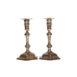 A PAIR OF GEORGE I BRITANNIA SILVER CANDLESTICKS, Matthew Cooper, London 1714 and 1715,