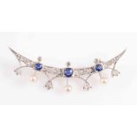 AN EDWARDIAN SAPPHIRE AND DIAMOND CRESCENT BROOCH,