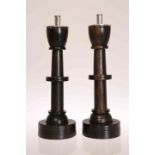 A PAIR OF ARTS AND CRAFTS SILVER MOUNTED HARDWOOD CANDLESTICKS, maker T.