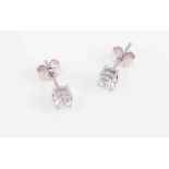 A PAIR OF DIAMOND STUD EARRINGS,