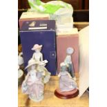 Two Lladro girl figures and two Nao figures,