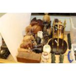 Collection of carved wood elephants, figures, etc; wine bottle pourer, soapstone carvings, goblets,