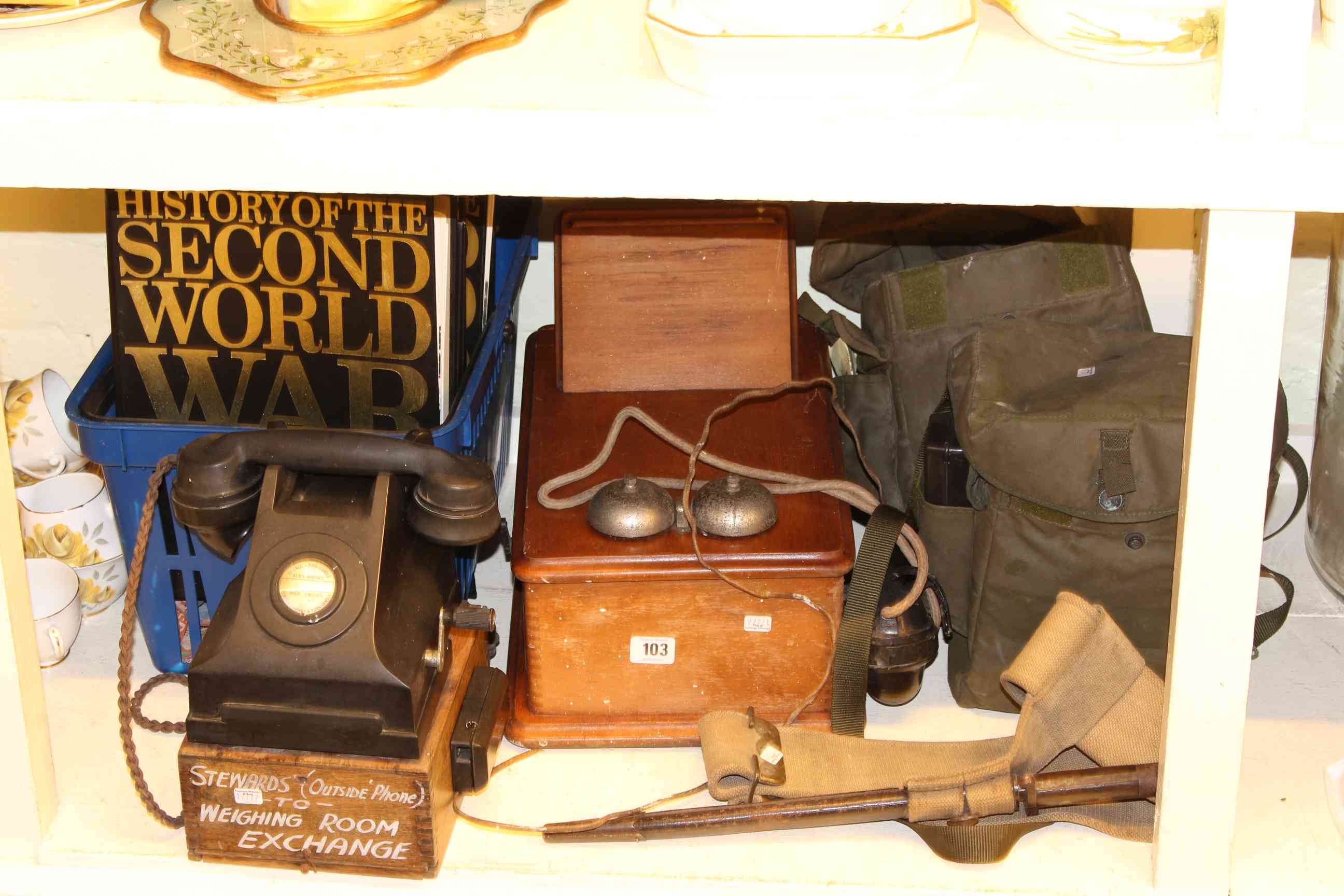 Two Falklands War gas masks, racing telephone and bell box,