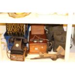 Two Falklands War gas masks, racing telephone and bell box,