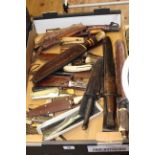 Collection of bayonets, folding knives, hunting knives, etc.