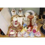 Eleven Coalport figures (ten with certificates), rose decorated china including Royal Albert,