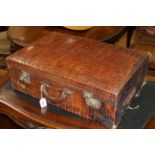 Large crocodile skin suitcase