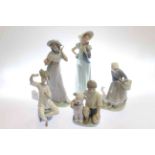 Two Lladro and three Nao figurines
