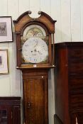 Antique oak eight day longcase clock having painted moon phase arched dial