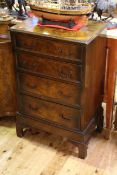 Flame mahogany chest of four drawers