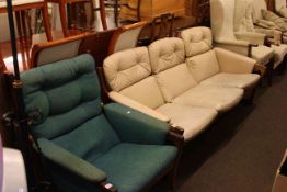 1960's teak three seater settee and rocking chair together with two later fireside chairs (4)