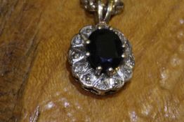 9 carat gold mounted sapphire and diamond pendant necklace