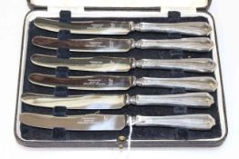 Cased set of silver knives,