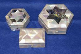 Three mother-of-pearl lidded boxes