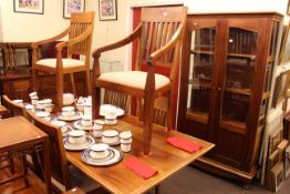 Hardwood nine piece dining suite comprising rectangular dining table, six chairs,