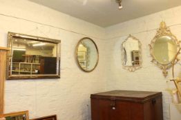 Collection of four wall mirrors