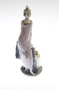 Lladro 'flapper' lady with puppy