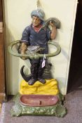 Painted cast iron stick stand in the form of a fisherman