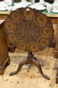 Carved mahogany circular snap top occasional table on tripod base