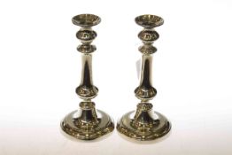 Pair silver-plated/polished metal candlesticks