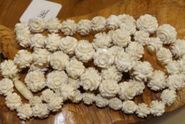 String of carved ivory beads,