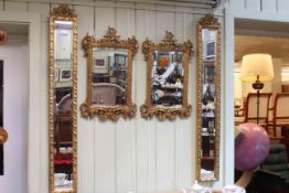 Pair gilt framed rectangular bevelled wall mirrors