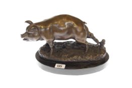 Bronze pig on oval base