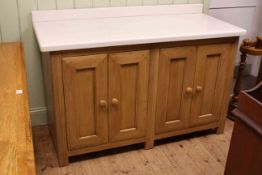 Fired Earth oak and composite topped four door kitchen floor unit