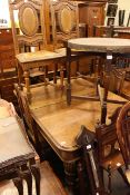Early 20th Century oak extending dining table,
