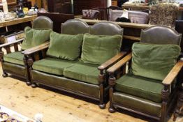 1920's/30's oak and green studded hide reclining three piece lounge suite