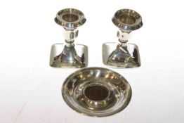 Pair silver dwarf candlesticks and penny inset dish