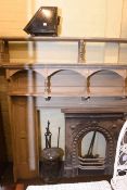 Cast fireplace, painted fire surround, pair fire dogs, two coal boxes, fire irons, sticks,