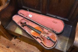 Cased violin and bow