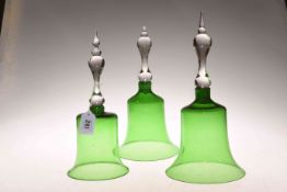 Three green-glass bell-form cloches