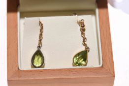 Pair of peridot and gold earrings