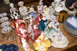 Collection of sixteen Royal Doulton figures, two Royal Worcester figures,