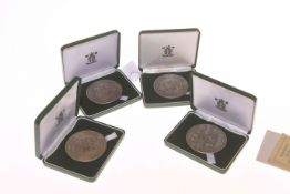 Four boxed silver Royal Mint Centenary medals, gross 19.